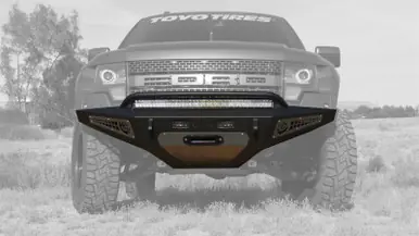 Addictive Desert Designs 10-14 Ford F-150 Raptor HoneyBadger Front Bumper w/ Winch Mount - F017275050103 Must Have
